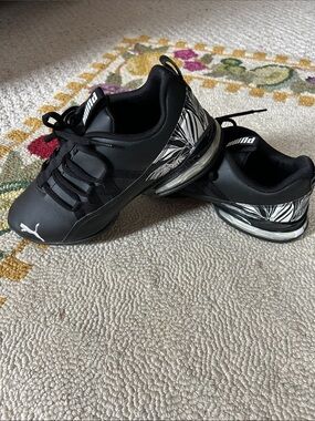 Puma Women’s Black Sneakers with White Graphic Accents